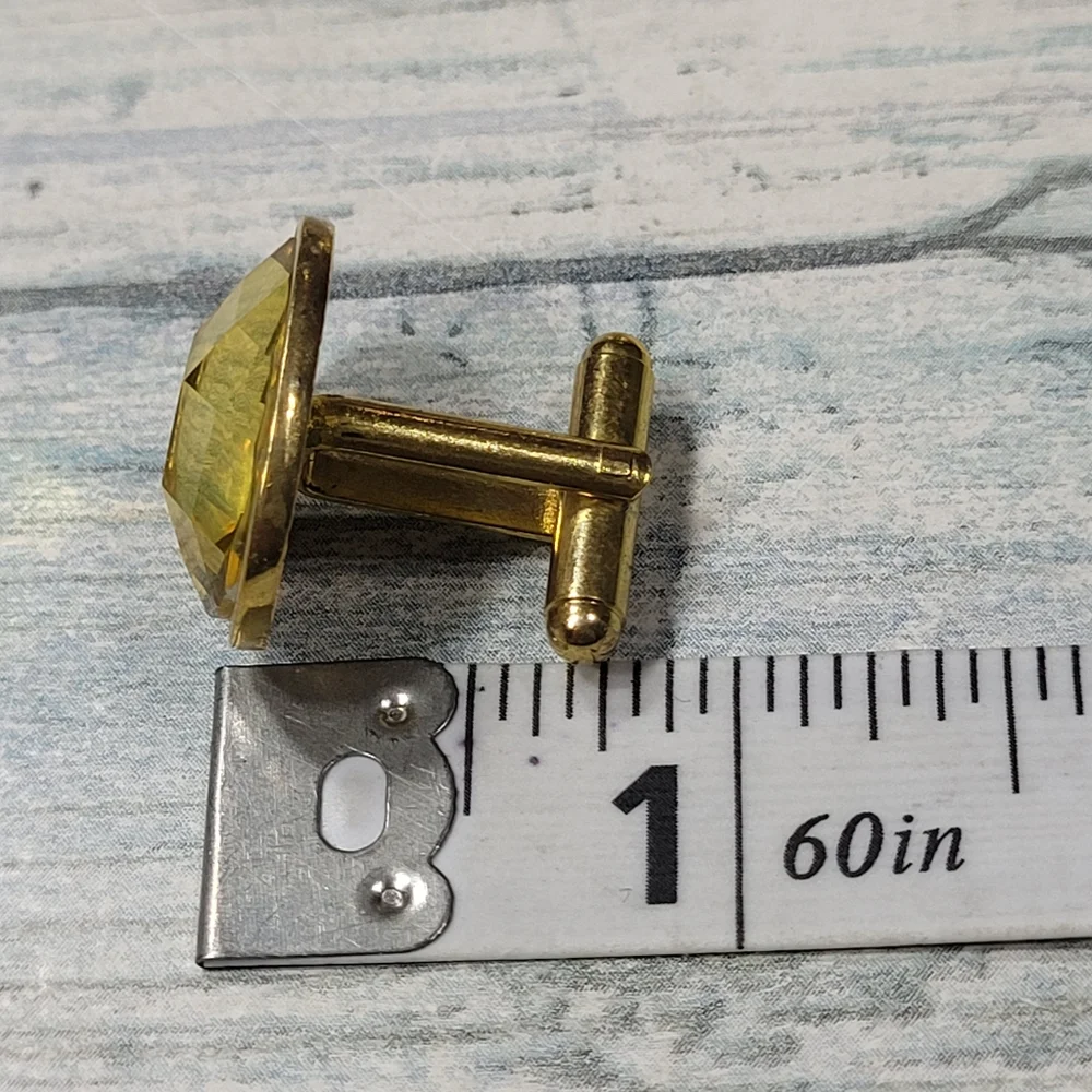 Yellow Plastic rhinestone Cuff Links.